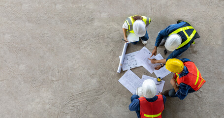 Wasp Waterproofing contractors reviewing project plans on site